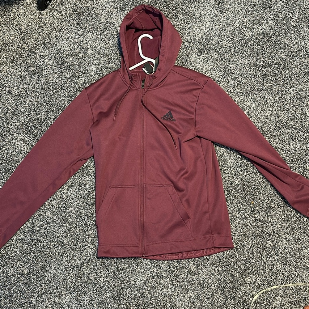Adidas size S hoodie. Never been worn.